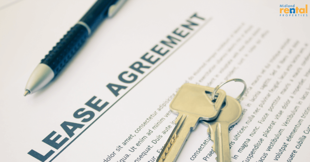 Lease agreement document with pen and house keys, representing rental contract signing.