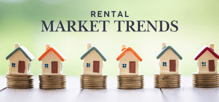 Row of small house figurines on stacks of coins, illustrating rental market trends — feature image for Midland, MI Rental Market Trends